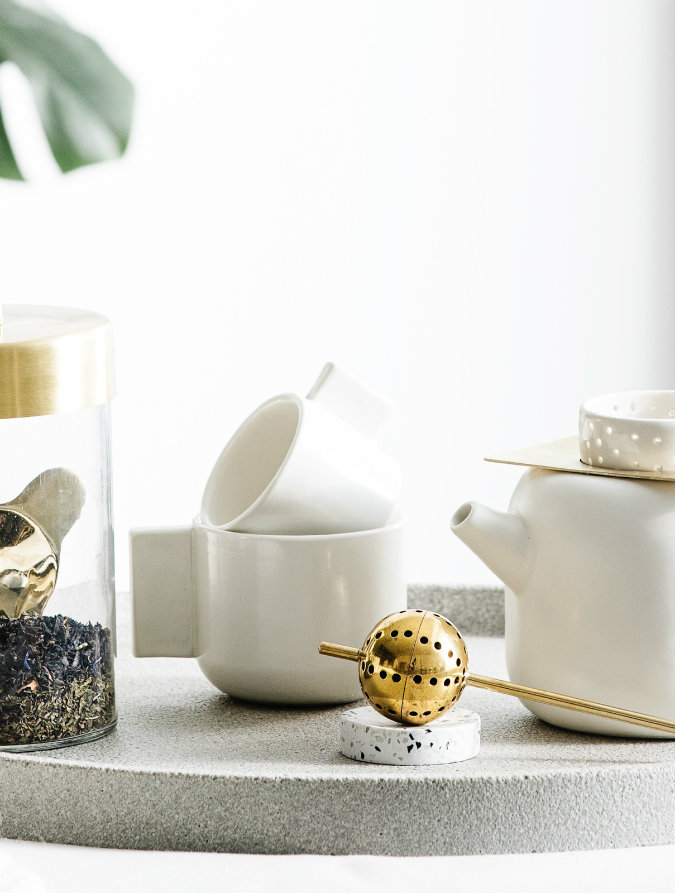 golden-white handmade pottery cups