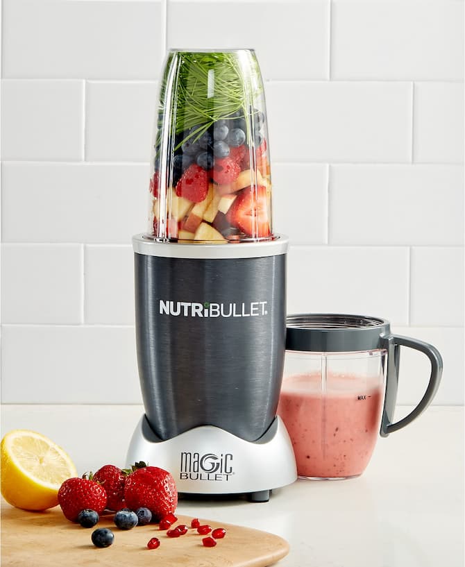 blender with fruits inside