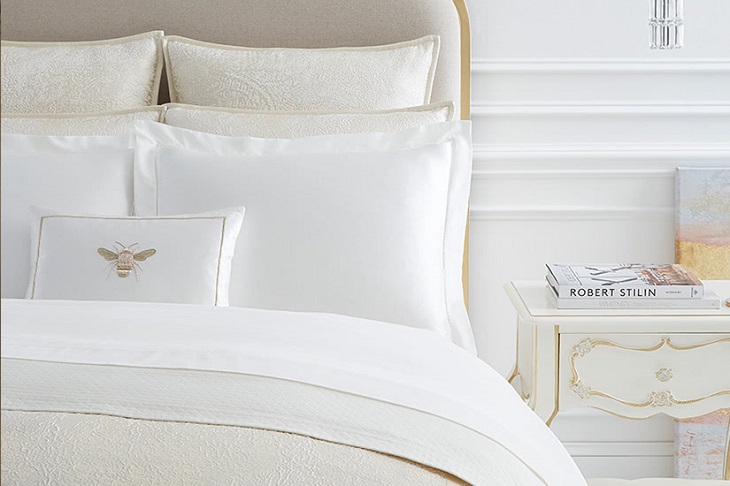 white sheets with golden details