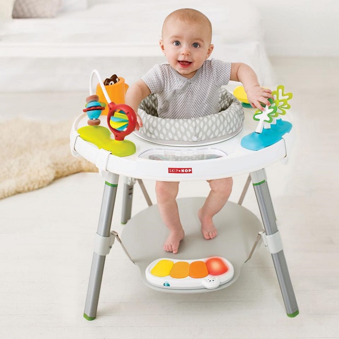 picture of a baby in an activity centre  