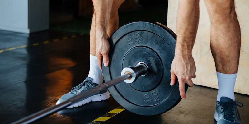 Man lifting a barbell