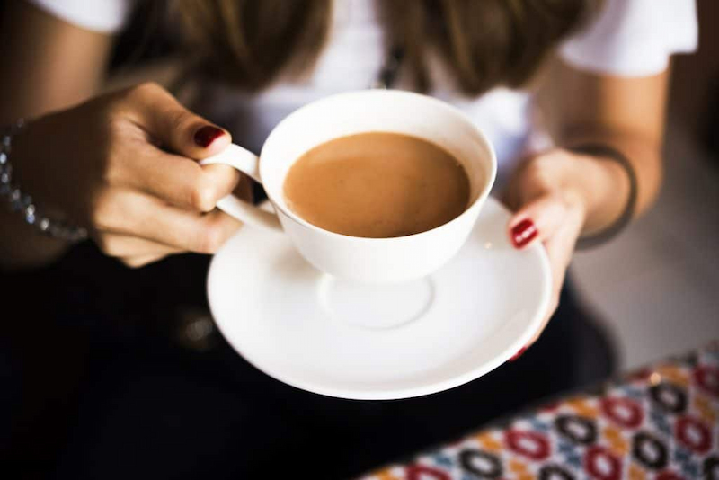 Woman drinking chai tea