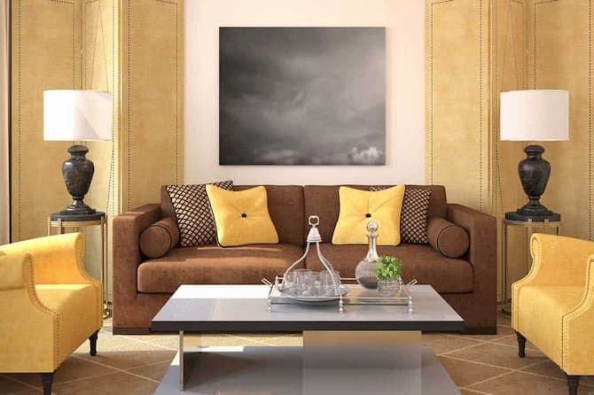 dark sofa with yellow pillows 