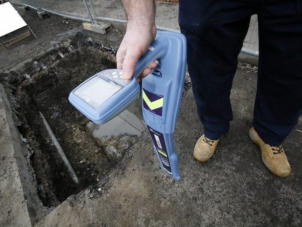 Man using Underground Pipe Cable Locator