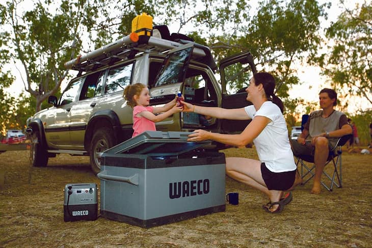 family with a dometic waeco camping fridge
