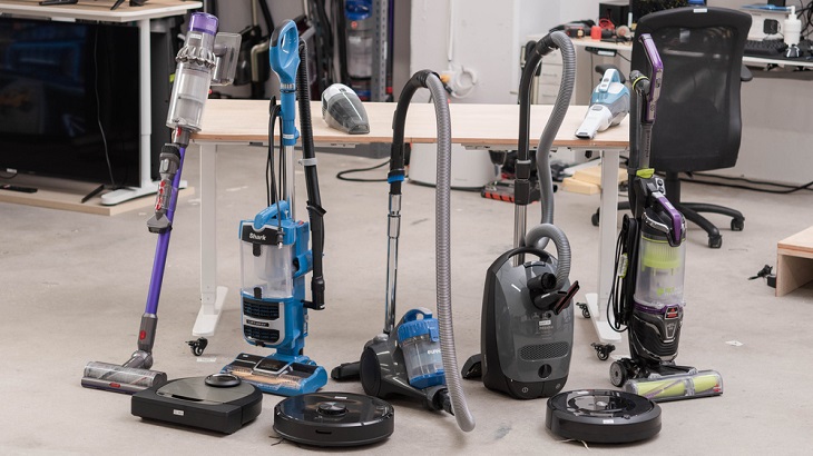 Close-up of 8 different types of vacuum cleaners 