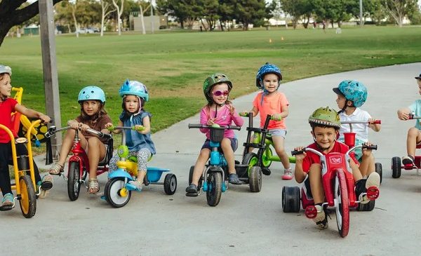 picture of kids on trikes