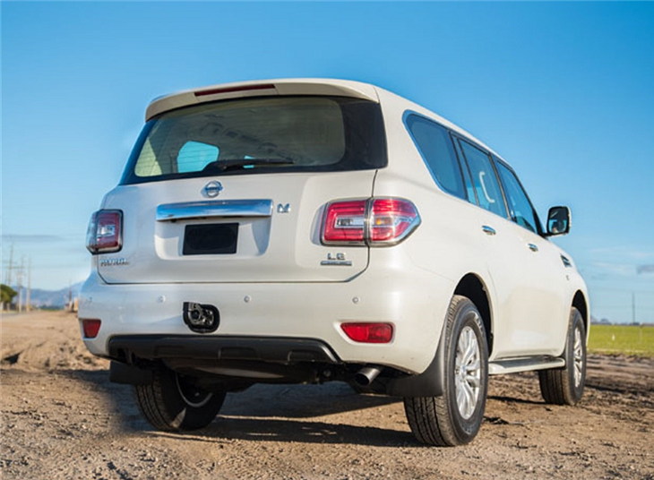 White Nissan Patrol Y62 parked