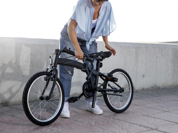 woman using her folding e-bike
